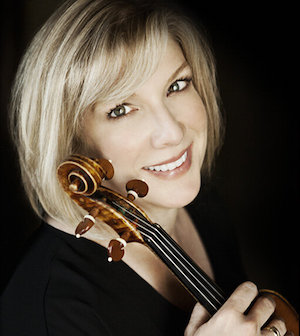 Annie Fullard holding a violin