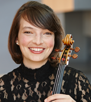 Headshot of Rebecca Albers holding a viola