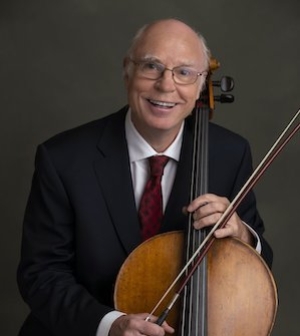 Hans Jensen holding a cello