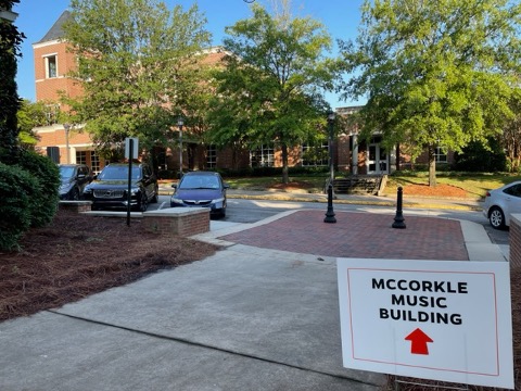 A sign points the way to McCorkle Music Building