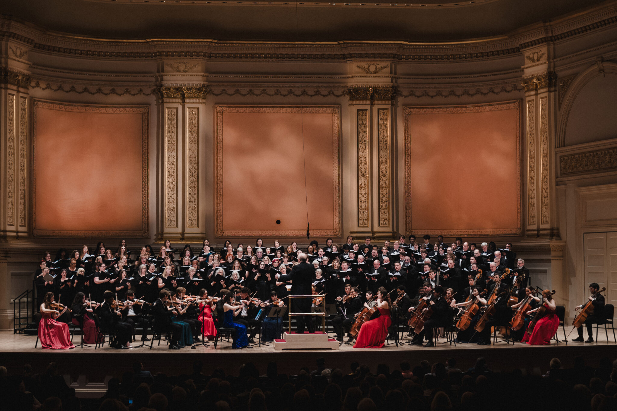 Mercer Singers, Choral Society of Middle Georgia, and Center for Strings on stage at Carnegie Hall