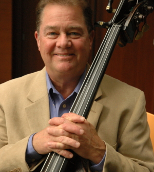 Hal Robinson headshot with double bass